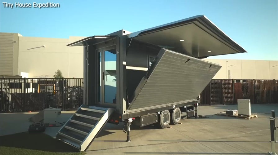 This small home on wheels folds and unfolds like a transformer.