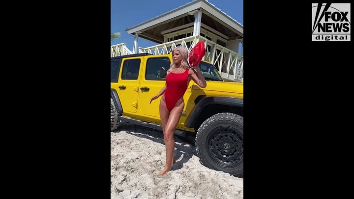 Donna D'Errico slips into 'Baywatch' swimsuit