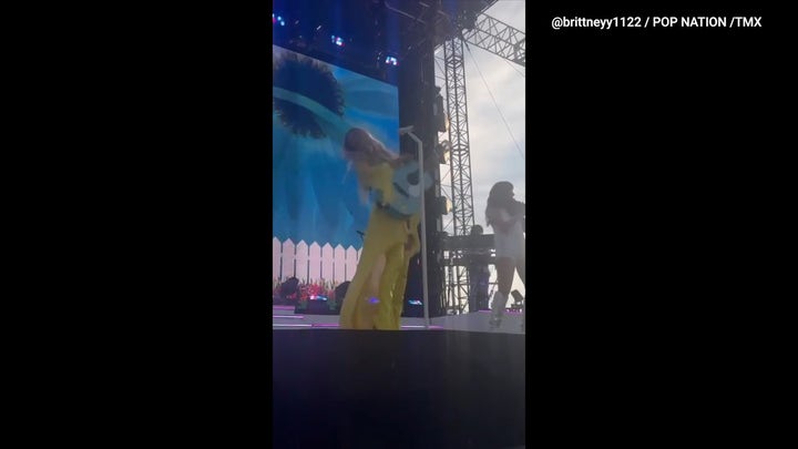 Kelsea Ballerini gets hit in the face with object thrown by fan at concert