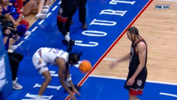 Darryn Peterson finishes TOUGH fastbreak slam and the foul, extending Kansas's lead over Utah