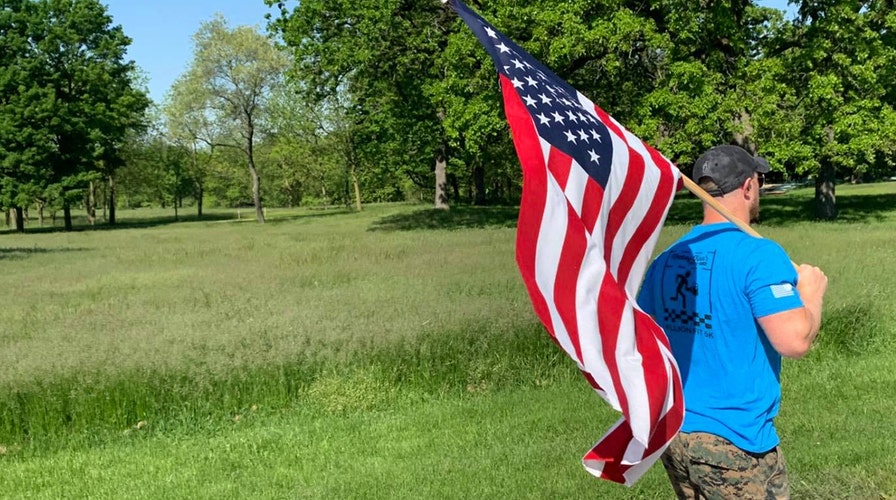 Man insists on running with American flag