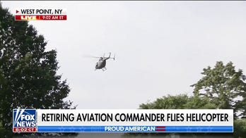 Retiring aviation commander flies helicopter over West Point