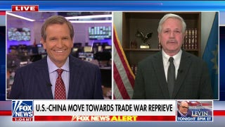 How are tariffs putting pressure on China's economy?