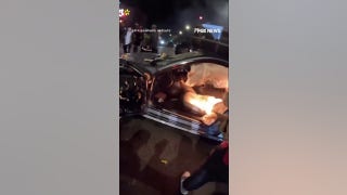 WATCH: Car catches fire, EXPLODES as mob takes over Chicago street