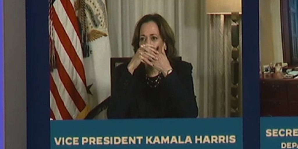 Vice President Harris covers mouth during live broadcast, appears to talk to staff