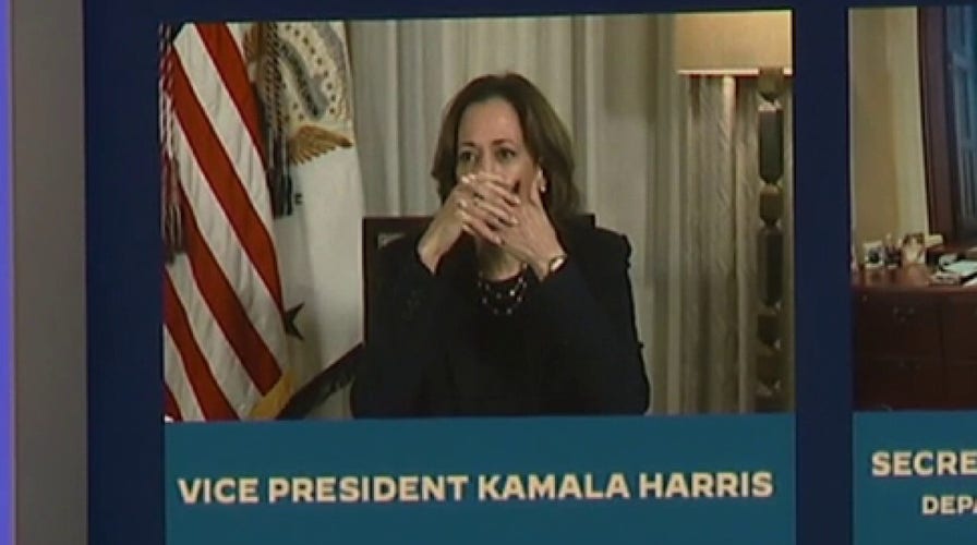 Vice President Harris covers mouth during live broadcast, appears to talk to staff