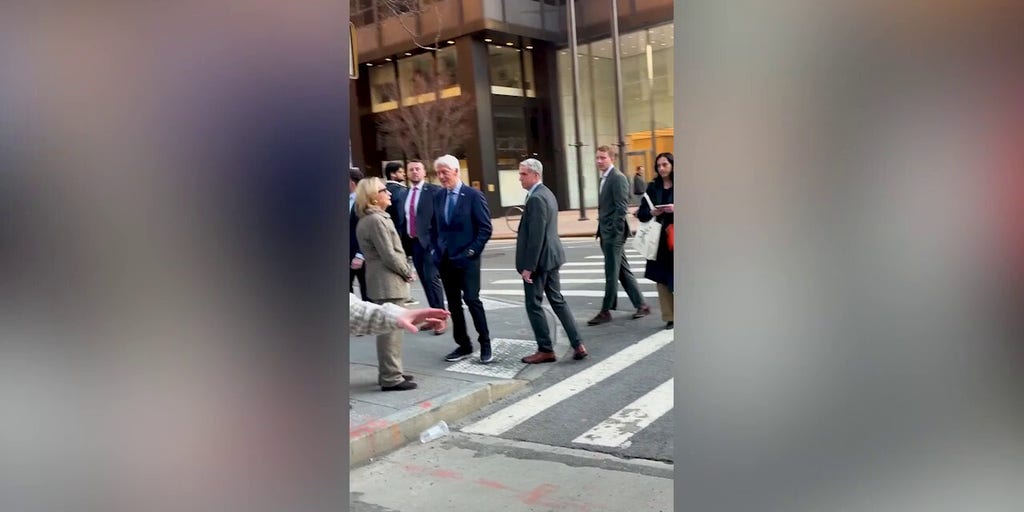 Former President Bill Clinton and Hillary Clinton seen taking stroll in New York City