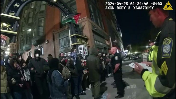 Boston police officer attempts to reason with anti-Israel protesters