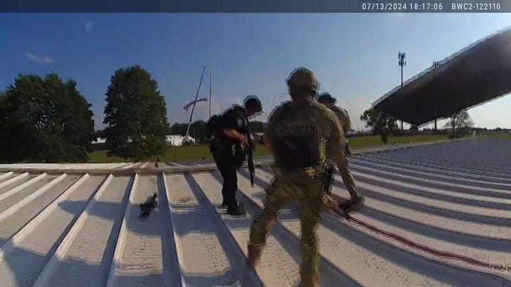 Trump assassination attempt bodycam video shows officer hoisted up to roof before shooting