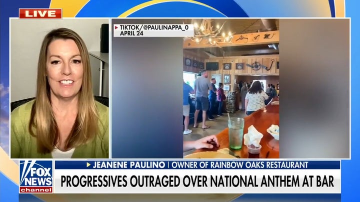 Progressives outraged after bar patrons stand for national anthem
