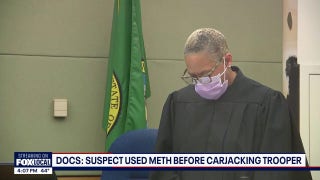 Suspect charged after allegedly carjacking trooper on I-5