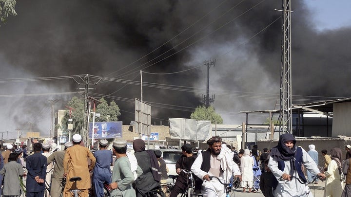 Afghans take cover near airport as gunfire rings out
