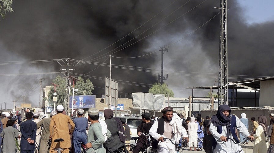 Afghans take cover near airport as gunfire rings out