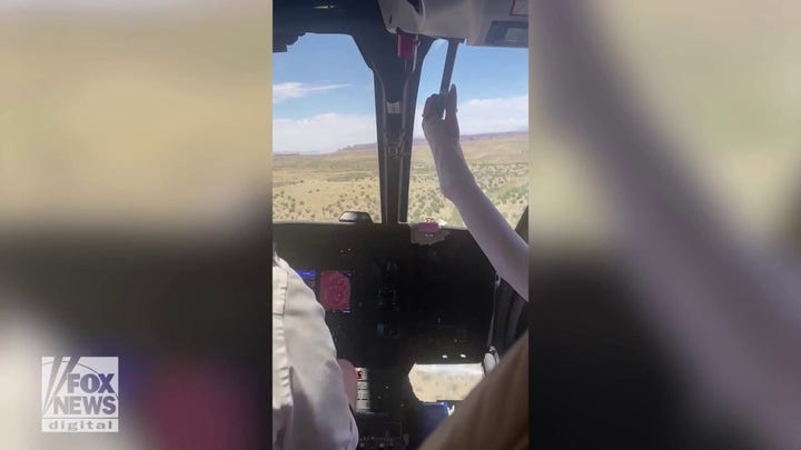 Helicopter pilot rips into passenger who reaches up for control lever