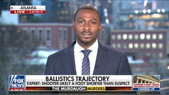  Son of defendant testifies in double slaying trial