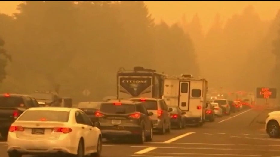 Death toll, evacuations rise from Western wildfires