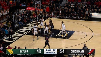 Baba Miller sinks a second-chance dunk, extending Cincinnati's lead over Baylor