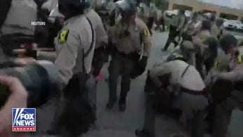 Law enforcement rush anti-ICE protesters near Chicago