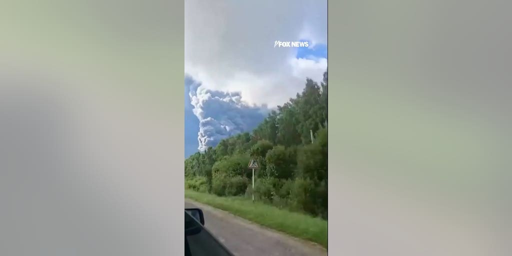 Thick smoke RISES after reported Ukrainian drone attack on Russian warehouse