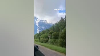 Thick smoke RISES after reported Ukrainian drone attack on Russian warehouse