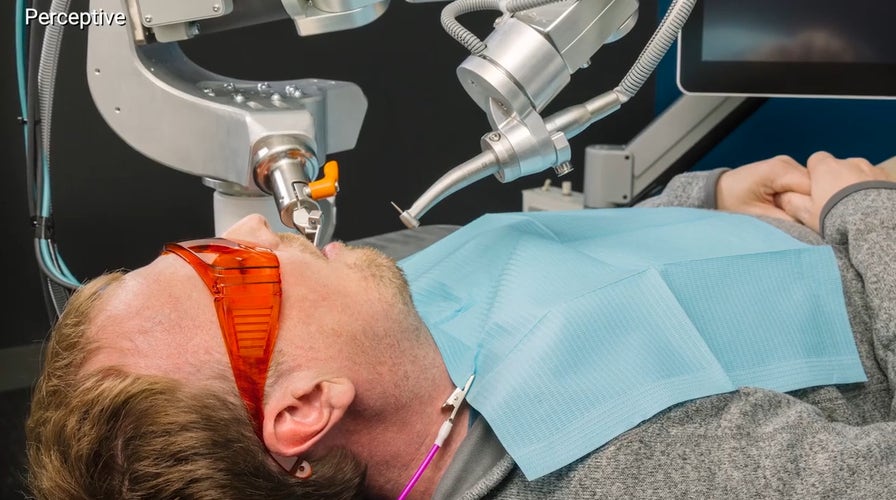 Would you trust a robot with your smile? A look at the future of robotic dentistry