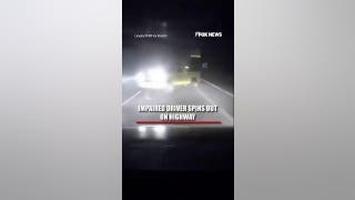 Driver swerves across highway before crashing into barrier, spinning out