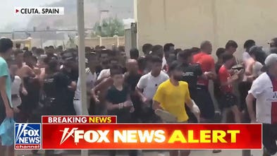 Migrants storm border of Spanish city of Ceuta as national emergency requested