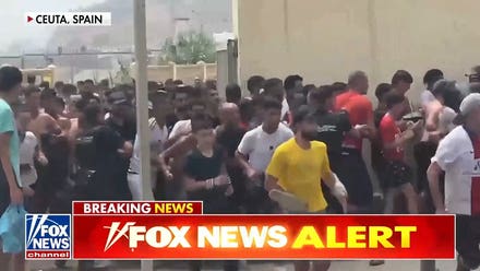 Migrants storm border of Spanish city of Ceuta as national emergency requested
