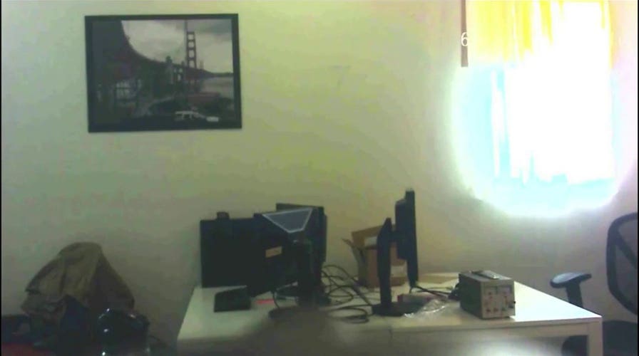Spy camera video shows engineer pouring substance into coworker's water