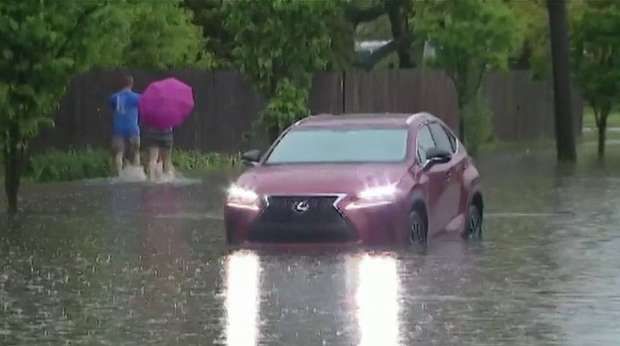 Heavy rains turn streets into rivers in Chicago