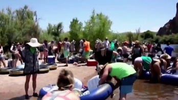 Some states scale back re-openings amid COVID-19 surge	