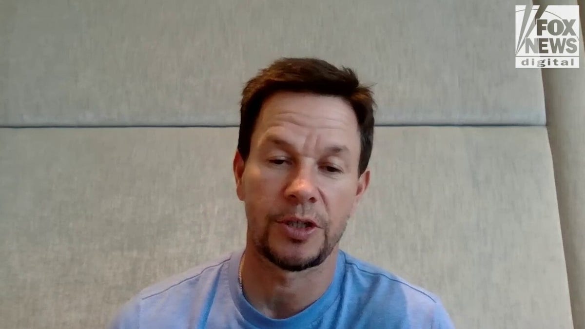 Mark Wahlberg steps out wearing a neck brace after injuring himself during  his sleep back in October