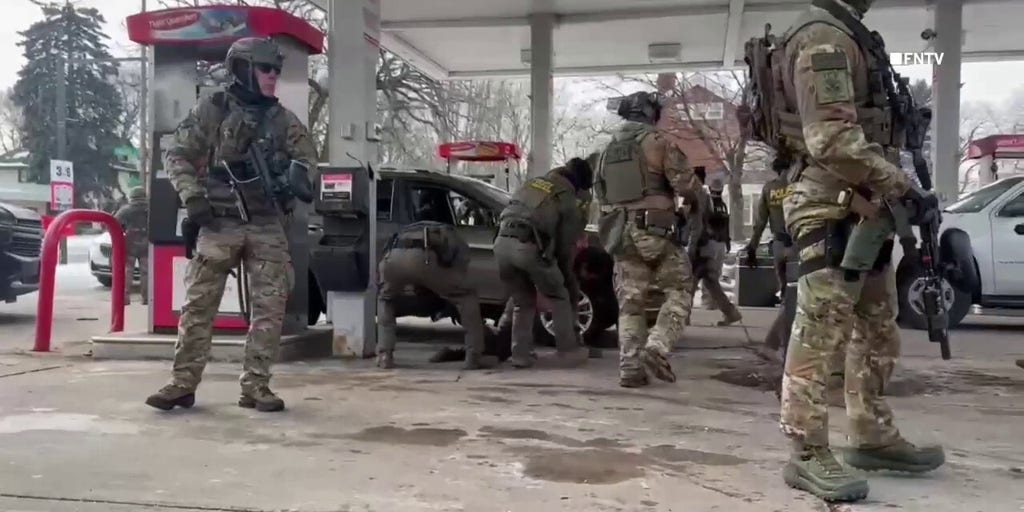 Video shows chaotic scene as Border Patrol agents detain two men in St Paul