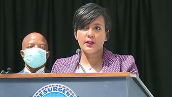 Atlanta mayor who tested positive for coronavirus faces backlash over earlier news conference without mask
