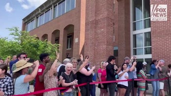 Johnny Depp fans cheer outside of the courthouse following verdict reading 