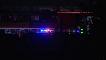 Police escort shoppers out of California mall after Black Friday shooting