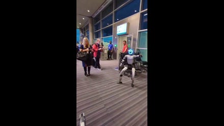 Dancing robot steals show at airport gate, briefly delays departing flight