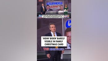 'HIDIN' BIDEN' barely visible in family Christmas card