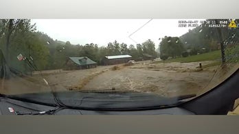 Video shows state trooper rescued after being swept up by Hurricane Helene floodwaters