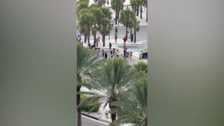 Teen shot during wild takeover at busy beach