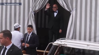 Jeff Bezos exits hotel in Venice ahead of wedding to Lauren Sánchez