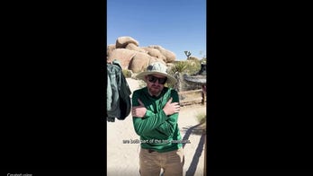 Search and Rescue volunteers show how to dress for desert exploration at Joshua Tree