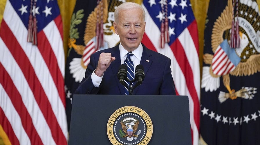 Biden uses 'cheat sheet' at first news conference