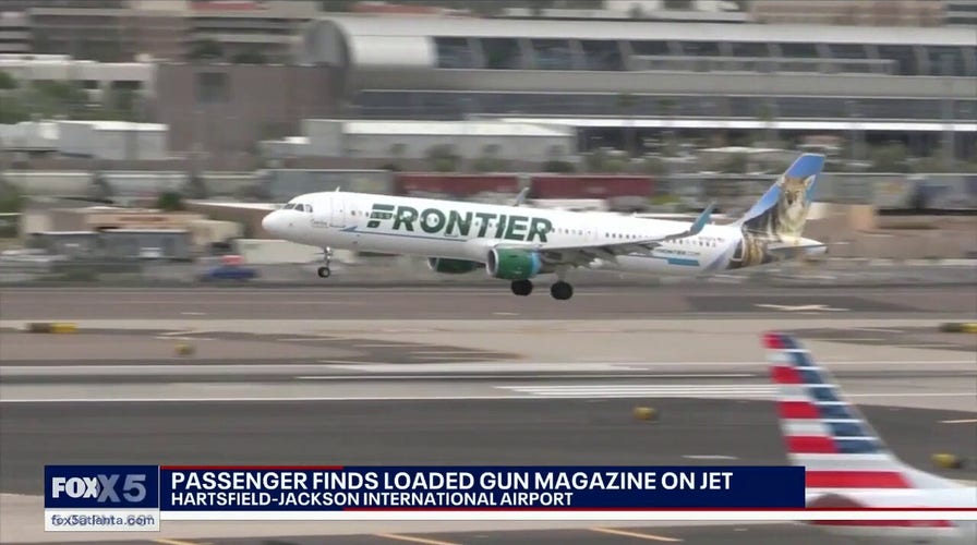 Loaded weapon  mag  recovered  connected  level   arsenic  passengers boarded successful  Atlanta