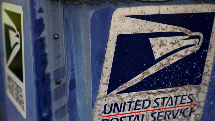 USPS delays cost-cutting changes that sparked concerns about election mail delays