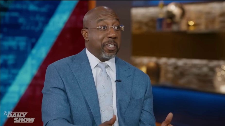 Sen. Raphael Warnock tells Jon Stewart he's not in love with politics, can separate it from faith