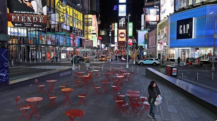 Times Square empty during morning rush hour in Manhattan