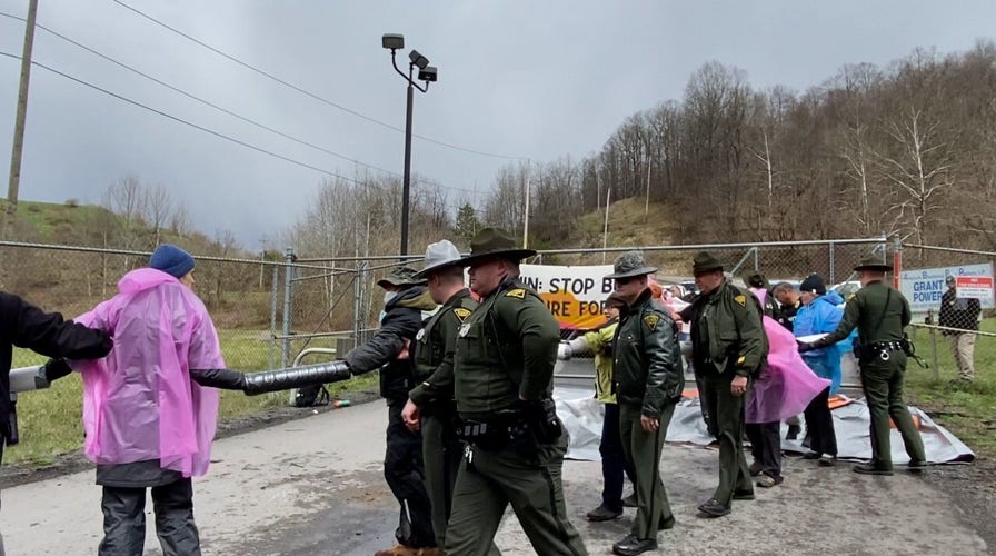 WATCH: Activists criticizing Sen. Joe Manchin arrested after protesting outside power plant