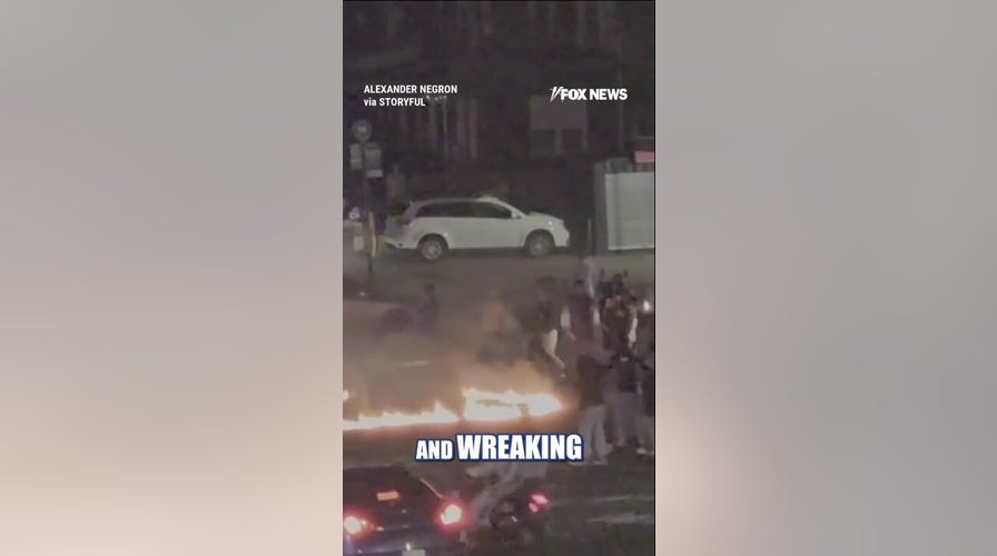 Mob flies Palestinian flag during FIERY drag race