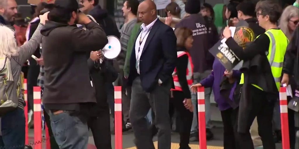 May Day protesters gather outside San Francisco International Airport